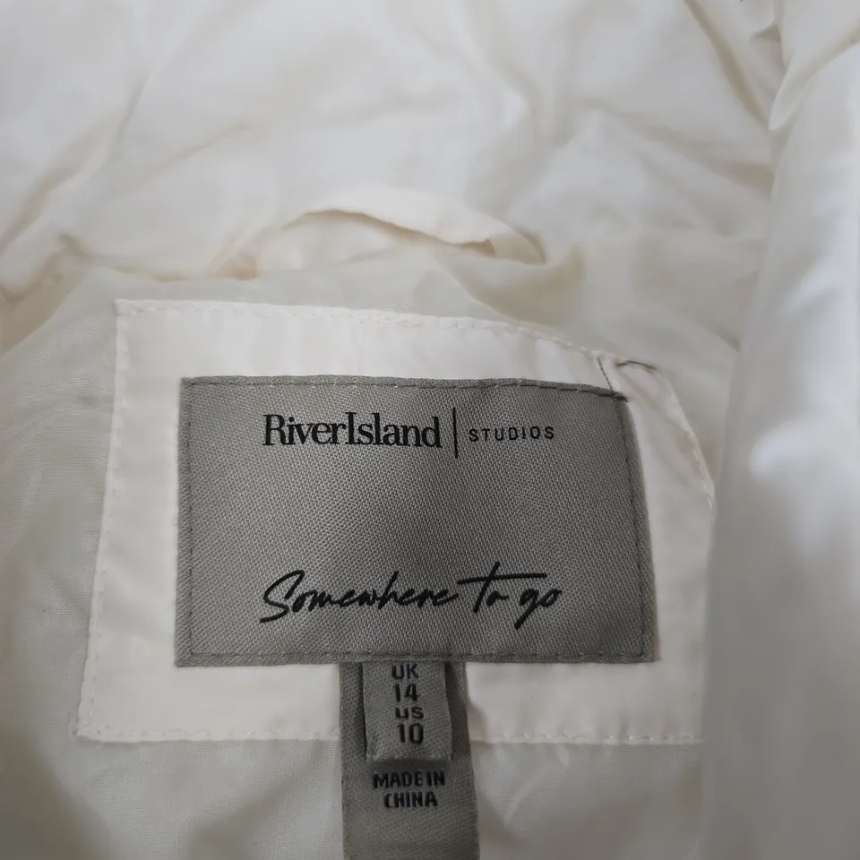 RIVER ISLAND STUDIOS SOMEWHERE TO GO PUFFER JACKET – UK 14 (US 10)