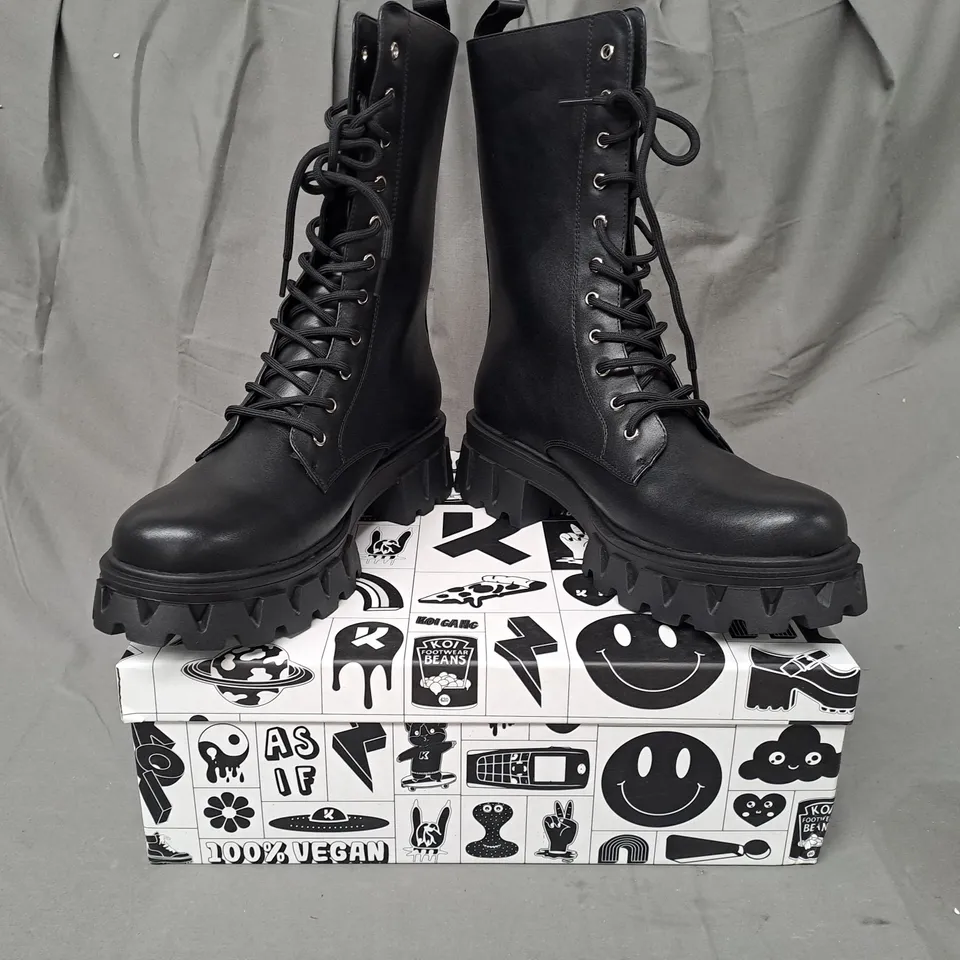 BOXED PAIR OF KOI VEGAN SIREN MEN'S TALL LACE UP BOOTS IN BLACK UK SIZE 9