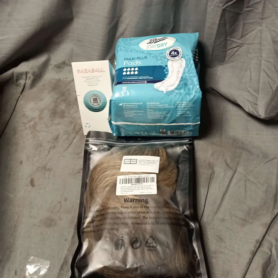 APPROXIMATELY 10 ASSORTED COSMETIC ITEMS TO INCLUDE MAXI PADS, WIGS, RAZABALL ETC
