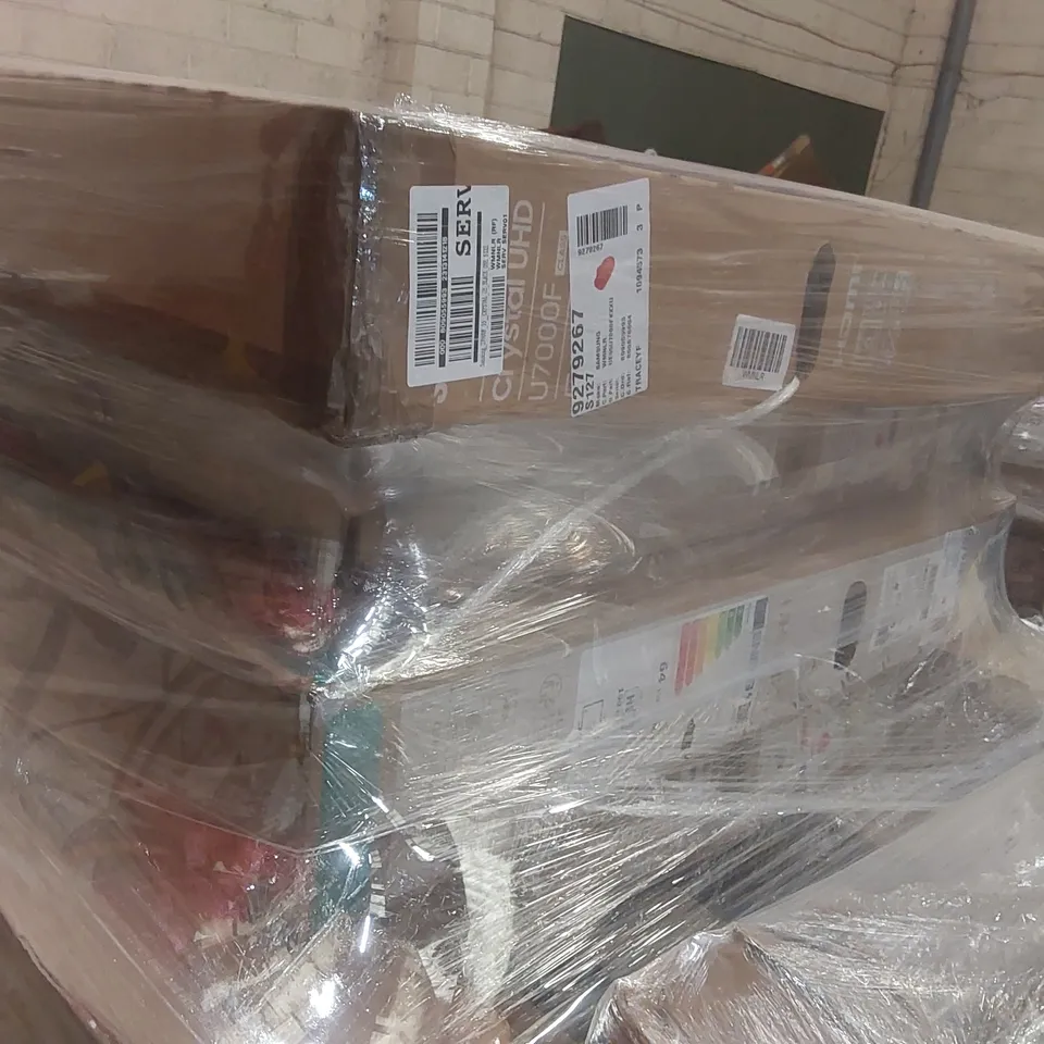 PALLET CONTAINING A LARGE QUANTITY OF ASSORTED DAMAGED TVs