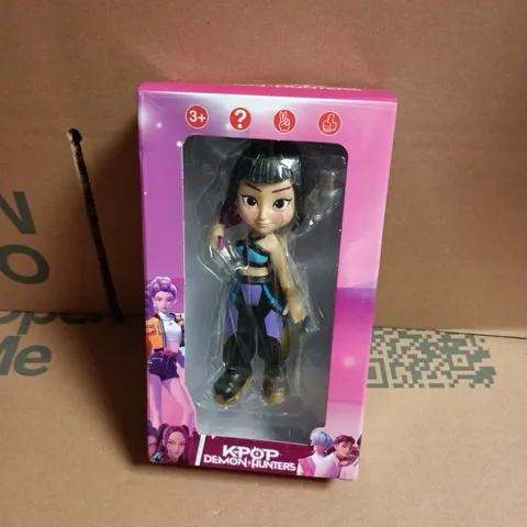 KPOP DEMON HUNTERS ACTION FIGURE IN PINK PACKAGING