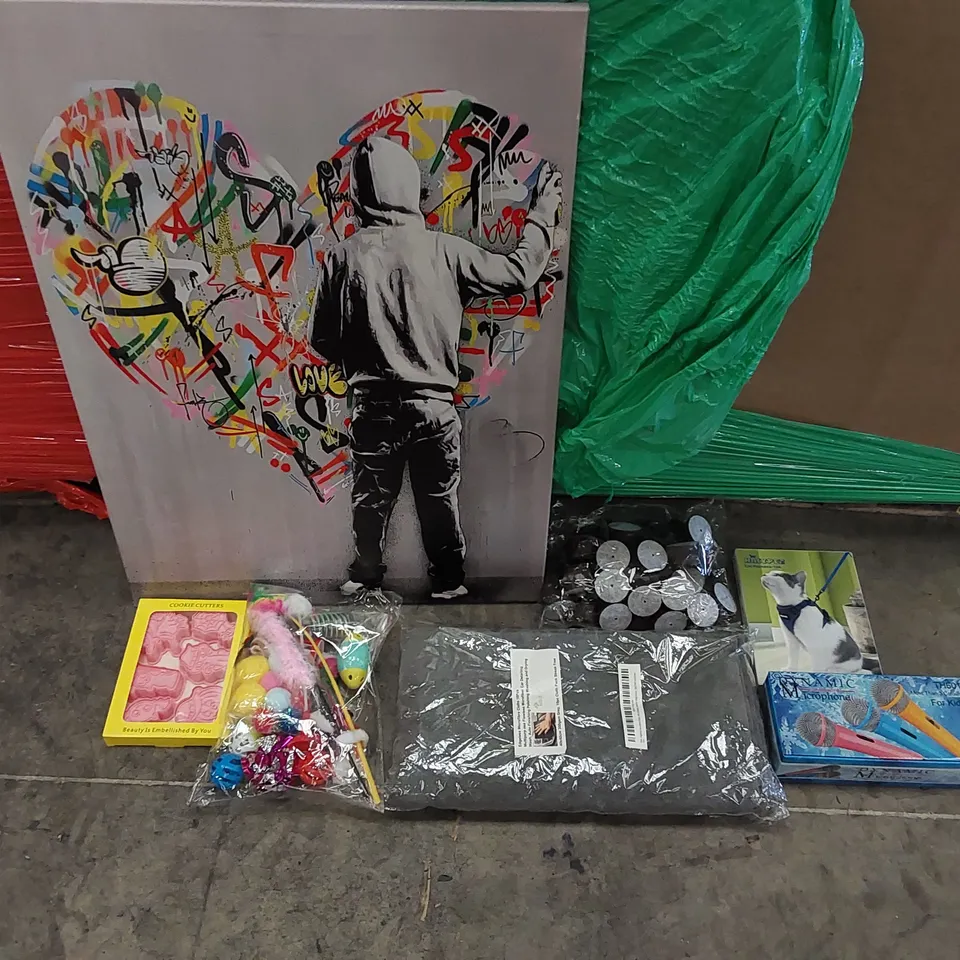 PALLET OF ASSORTED ITEMS INCLUDING: ART WORK, MICROPHONES, MICROFIBER CLOTH, CAT HARNESS AND TOYS, COOKIE CUTTERS, COFFEE PODS