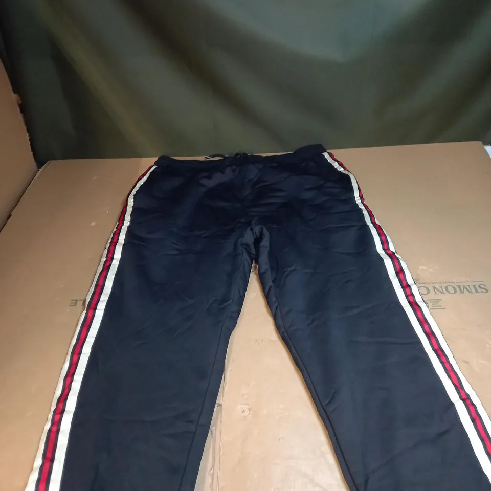 PAIR OF LEG STRIPPED JOGGING BOTTOMS SIZE L