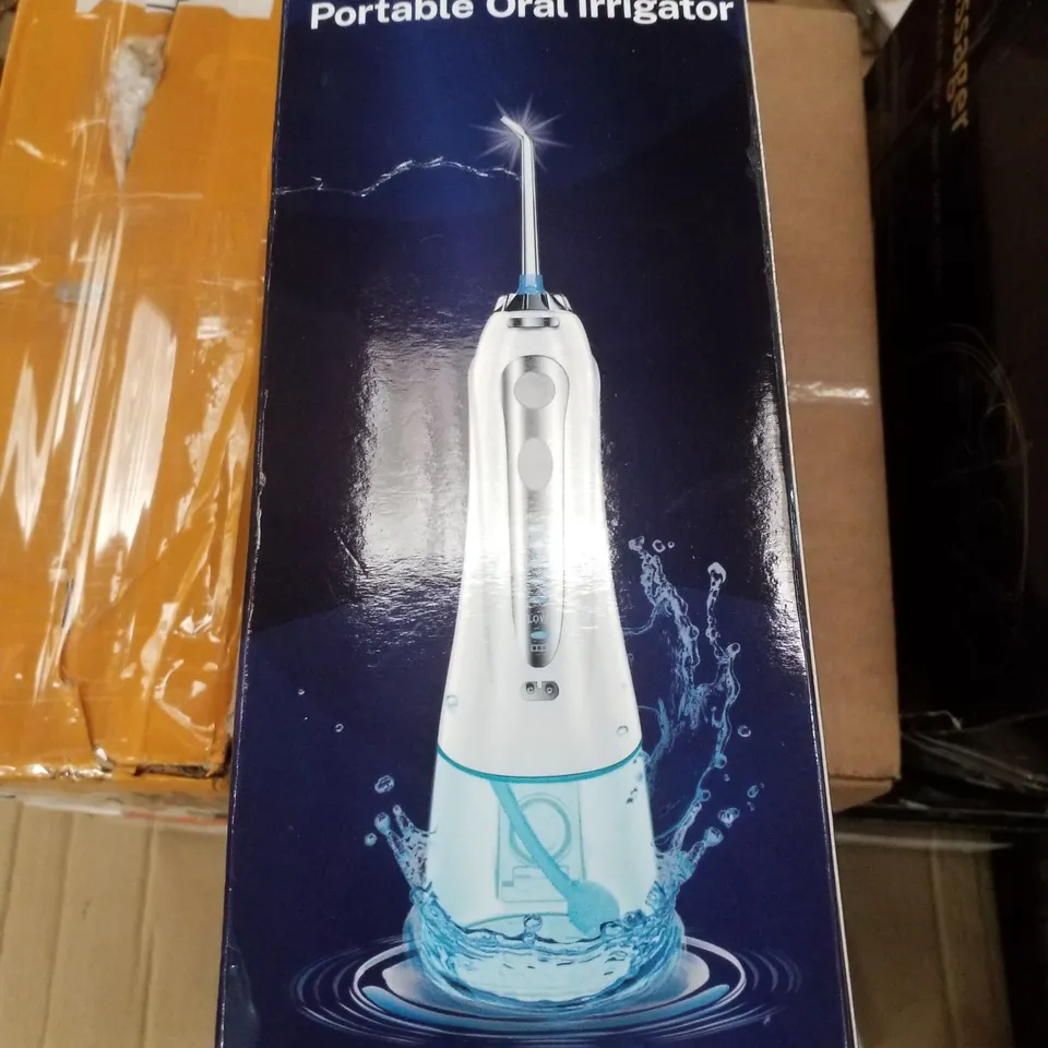 BOXED PORTABLE ORAL IRRIGATOR