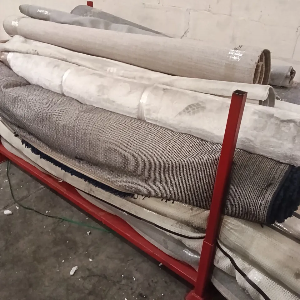 STILLAGE OF DESIGNER RUGS APPROXIMATELY 16 RUGS MEDIUM / LARGE