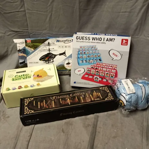APPROXIMATELY 15 ASSORTED TOYS, GAMES, GIFTS AND NOVELTIES TO INCLUDE GUESS WHO I AM GAME, FLOATING CANDLES, CUTE BIRDS TOY, ETC - COLLECTION ONLY