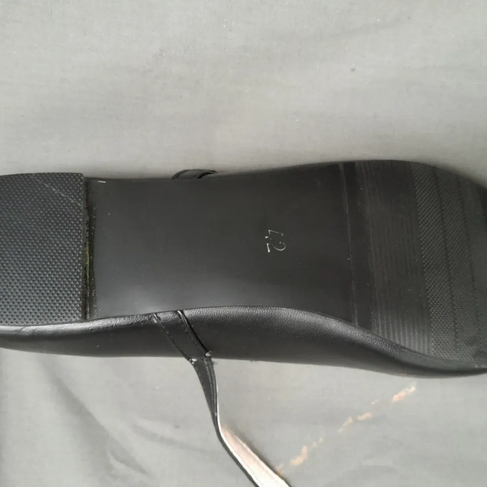 BOXED PAIR OF DESIGNER FLAT SHOES IN BLACK EU SIZE 42