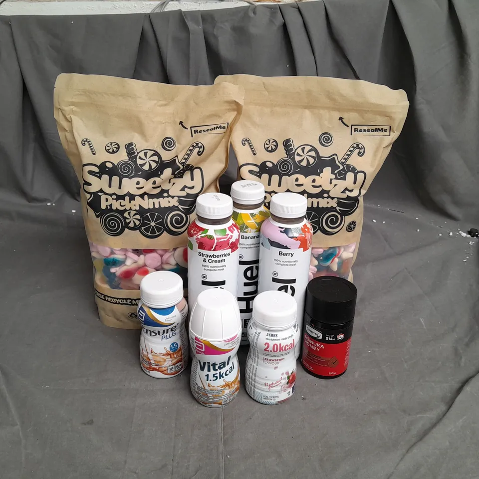 9 ASSORTED FOOD ITEMS TO INCLUDE SWEETXY PICK N MIX 2.75KG, COMVITA MANUKA HONEY, HUEL FOOD DRINK, ENSURE PLUS CHOCOLATE FOOD DRINK, VITAL CAFFE LATTE FOOD DRINK AND AYMES STRAWBERRY FOOD DRINK- COLLE