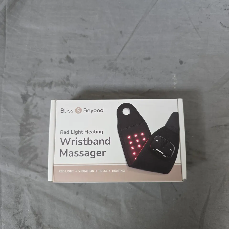 BLISS & BEYOND WRISTBAND MASSAGER - RED LIGHT HEATING, BOXED