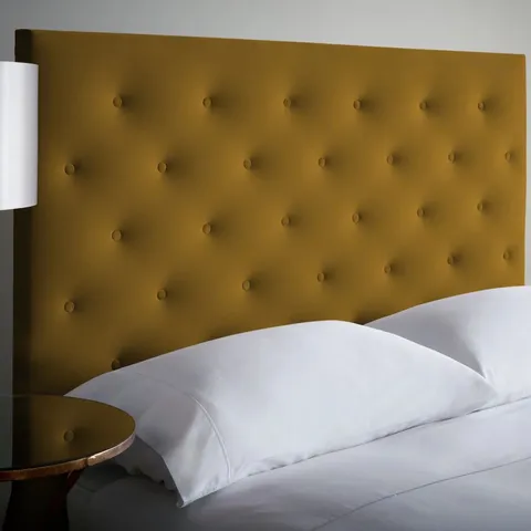 BOXED ZEPHYRINE UPHOLSTERED HEADBOARD.