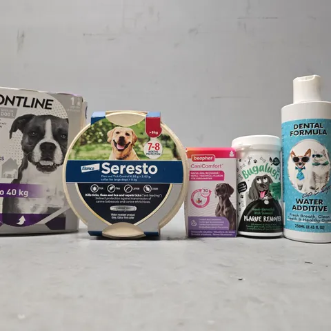 TOTE OF APPROXIMATELY 13 ASSORTED PET ITEMS TO INCLUDE -BUGALUGS PLAQUE REMOVER , DENTAL FORMULA WATER ADDITIVE , ELANCO SERESTO ETC