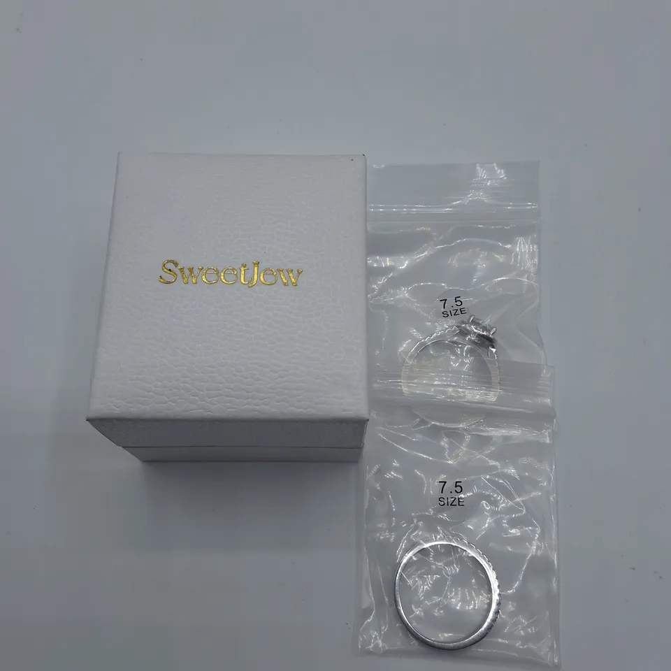 PAIR OF SWEETJEW 1.2CT CUBIC ZIRCONIA RINGS