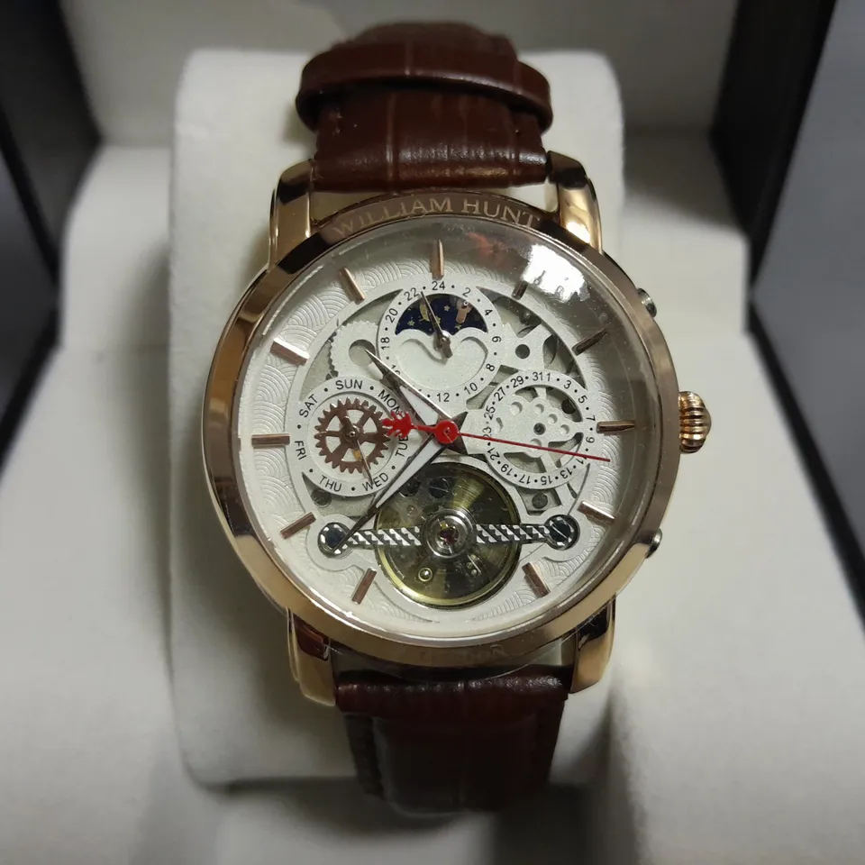 WILLIAM HUNT SKELETON DIAL GENTS ALL STAINLESS STEEL WATCH WITH BROWN LEATHER STRAP