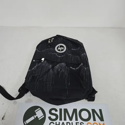 HYPE BLACK GRAFFITI BACKPACK WITH PAINT-SPLATTER DESIGN