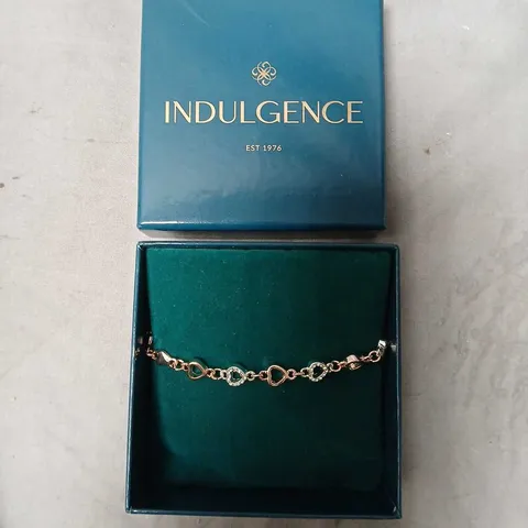 INDULGENCE BRACELET IN DISPLAY BOX – SILVER-TONE LINKED CIRCLE DESIGN