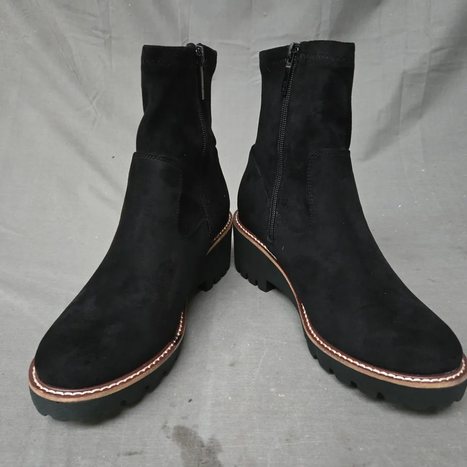 BOXED PAIR OF LINZI WEDGE ANKLE BOOTS IN BLACK SIZE 6