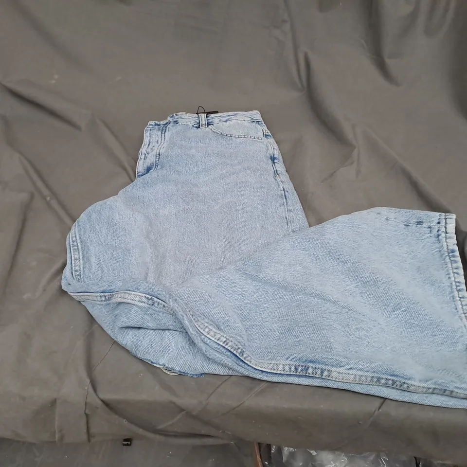 RITA ORA LIGHT BLUE UK 14 JEANS RIPPED