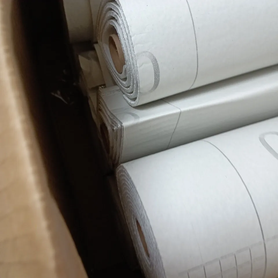 BOX CONTAINING APPROXIMATELY 7 ROLLS OF SELF ADHESIVE COILED WALL STICKERS. SOME NEW SOME ALREADY USED.