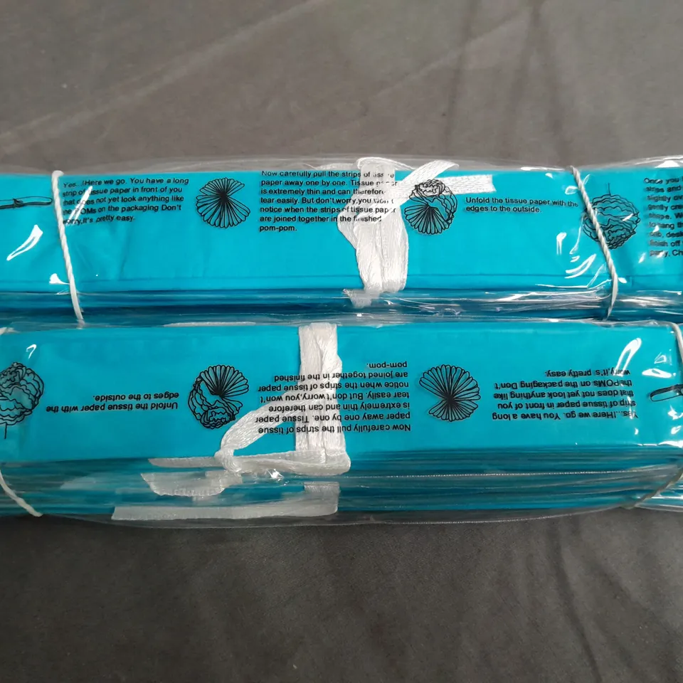 LOT OF APPROXIMATELY 100 10" BLUE TISSUE PAPER DECORATIONS