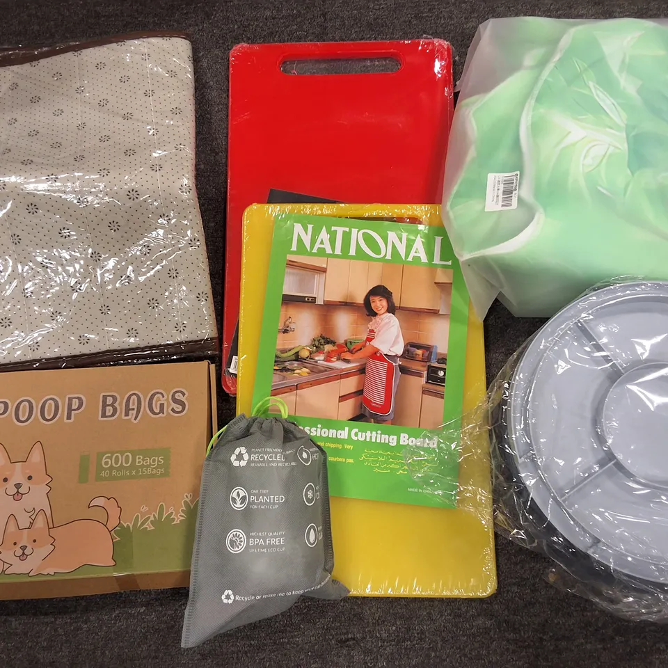 LOT OF ASSORTED HOUSEHOLD ITEMS TO INCLUDE DOG POOP BAGS, CHOPPING BOARDS AND HOME FABRICS