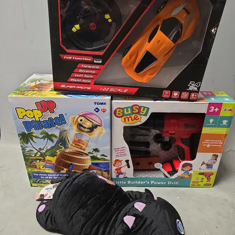 BOX OF APPROXIMATELY 20 ASSORTED TOYS TO INCLUDE - WINDSPEED RC CAR , POP UP PIRATE , BUSY ME ETC