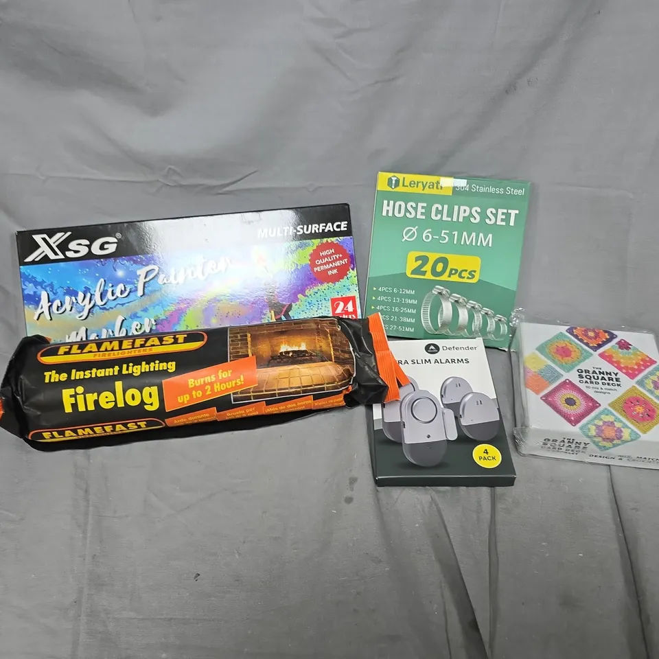 APPROXIMATELY 12 ASSORTED HOUSEHOLD ITEMS TO INCLUDE ACRYLIC PAINTER MARKERS, HOSE CLIPS SET, FIRELOGS, ETC