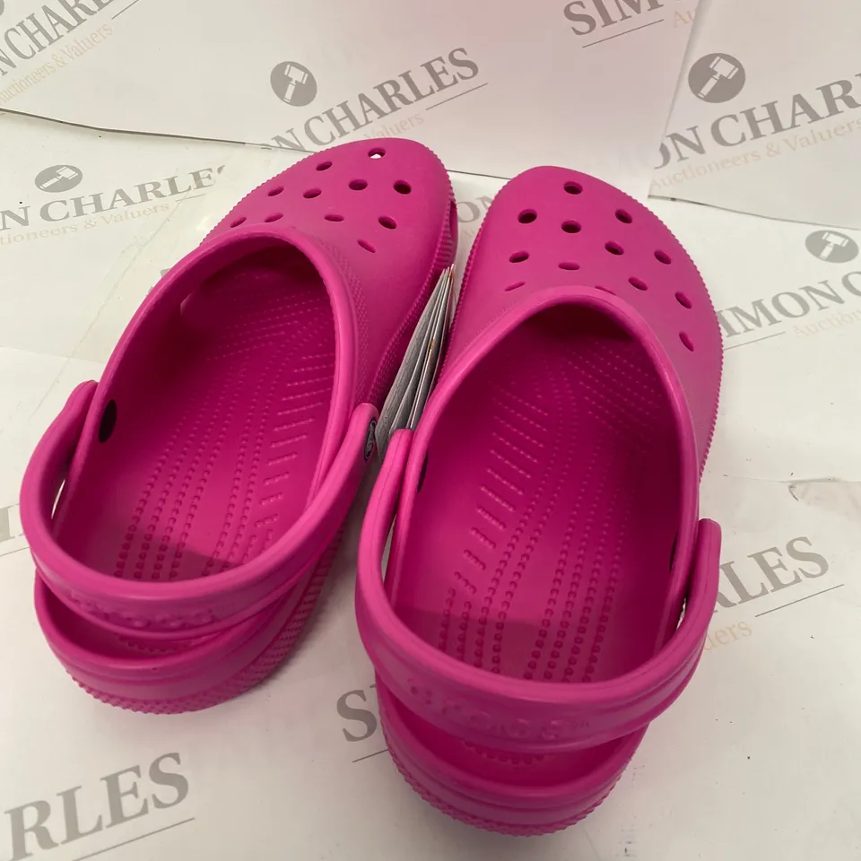 PAIR OF PINK CROCS SIZE M8 W10