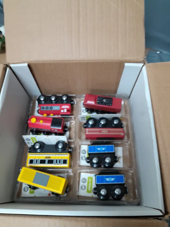 Lot 4084: APPROXIMATELY 16 WOODEN MINI TRAINS - ASSORTED COLOURS ...