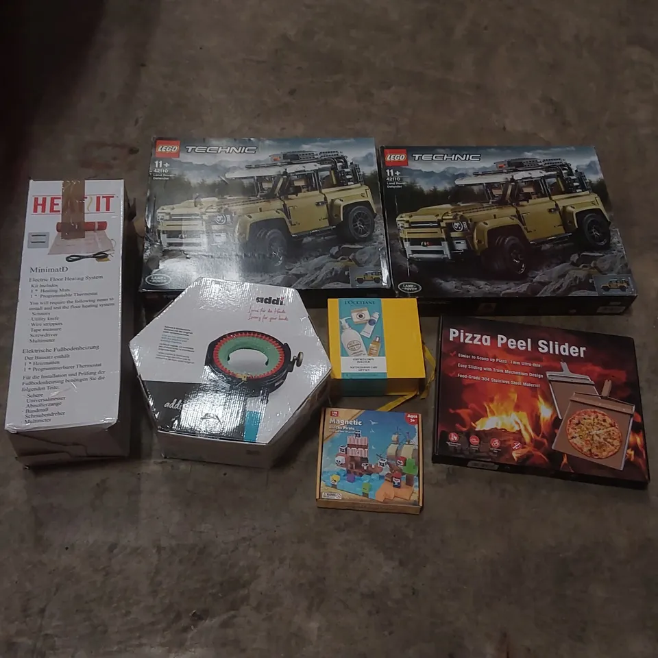 PALLET CONTAINING ASSORTED ITEMS TO INCLUDE: LEGO TECHNIC LAND ROVER DEFENDER SETS, ELECTRIC FLOOR HEATING SYSTEM, ADDI KNITTING MACHINE, PIZZA PEEL SLICER, L'OCCITANE BODY CARE SET ECT