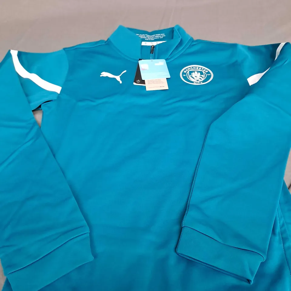 PUMA MANCHESTER CITY QUARTER ZIP IN TEAL - EU XS