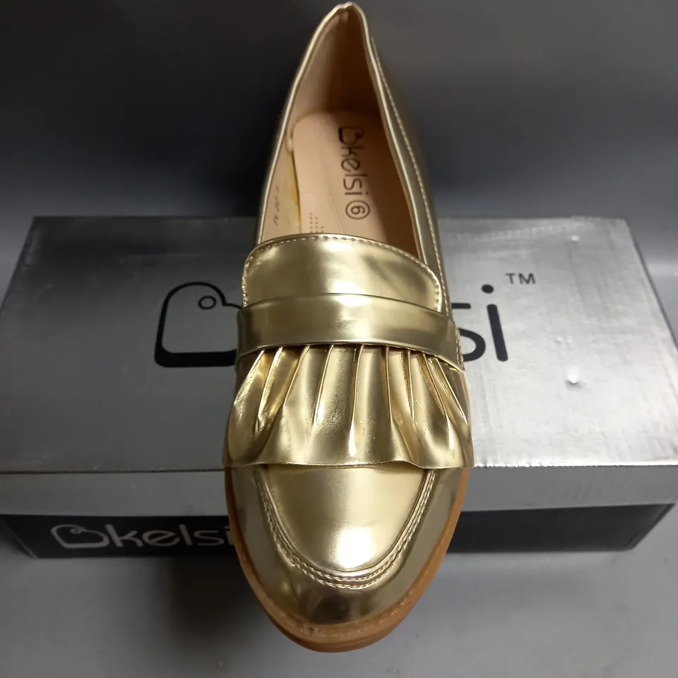 BOXED KELSI LADIES FLAT GOLD BROGUES. SIZE 6