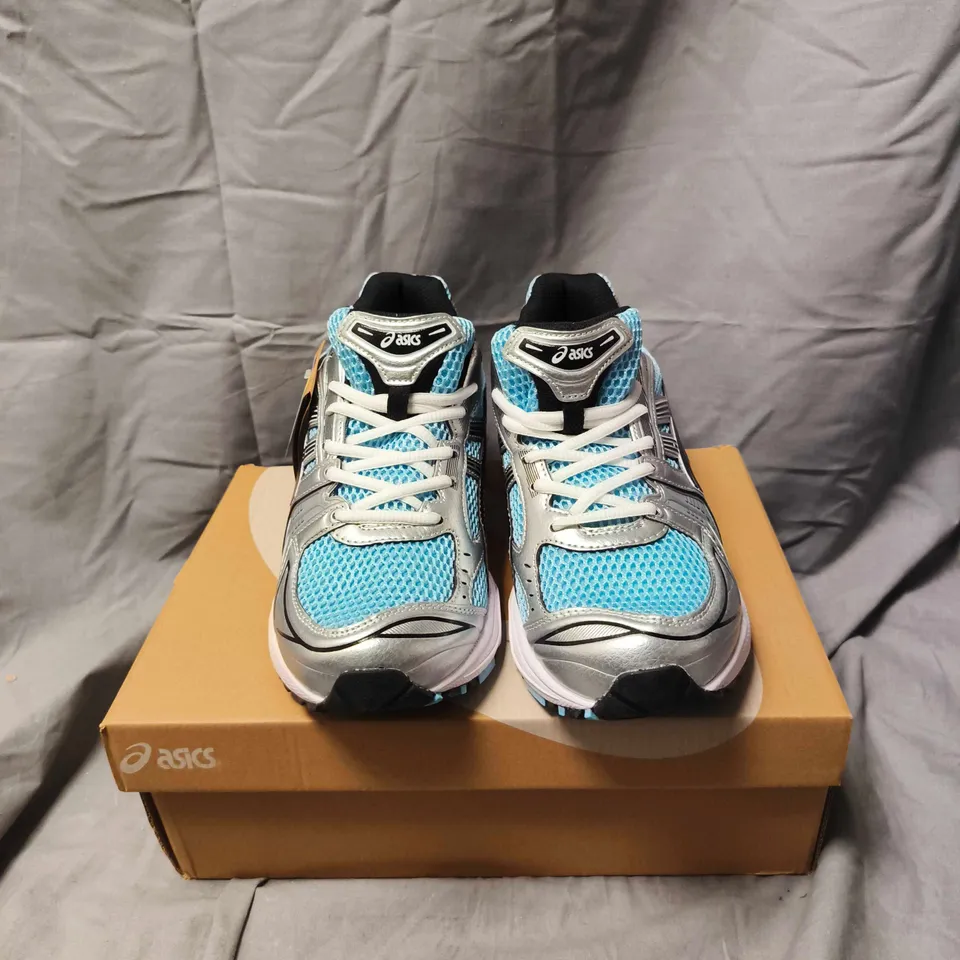 BOXED PAIR OF ASICS RUNNING SHOES – TURQUOISE MESH WITH SILVER OVERLAYS - SIZE 10