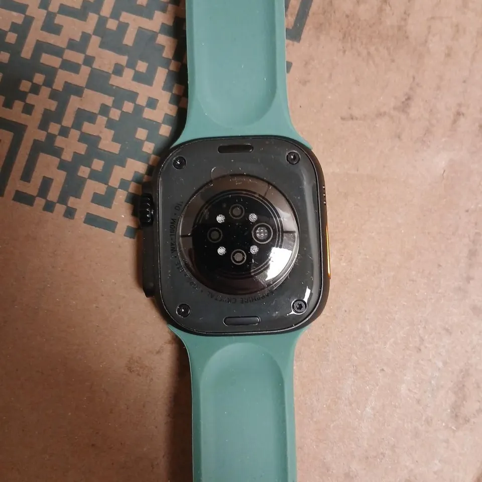 SMARTWATCH WITH TEAL SILICONE STRAP