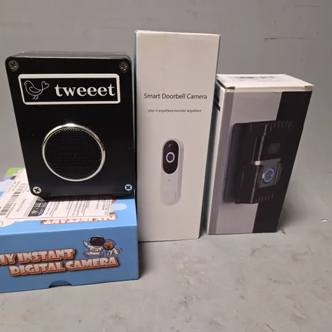 TOTE OF APPROXIMATELY 4 ASSORTED ITEMS TO INCLUDE - SMART DOORBELL CAMERA , RING CAMERA PROTECTOR ,  TWEEET SOUND BOX ETC