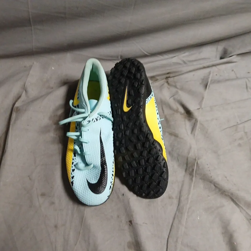 NIKE FOOTBALL BOOTS – LIGHT BLUE WITH BLACK SWOOSH AND YELLOW ACCENTS