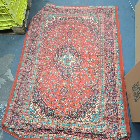 RED ORIENTAL RUG WITH CENTRAL MEDALLION AND INTRICATE BORDER