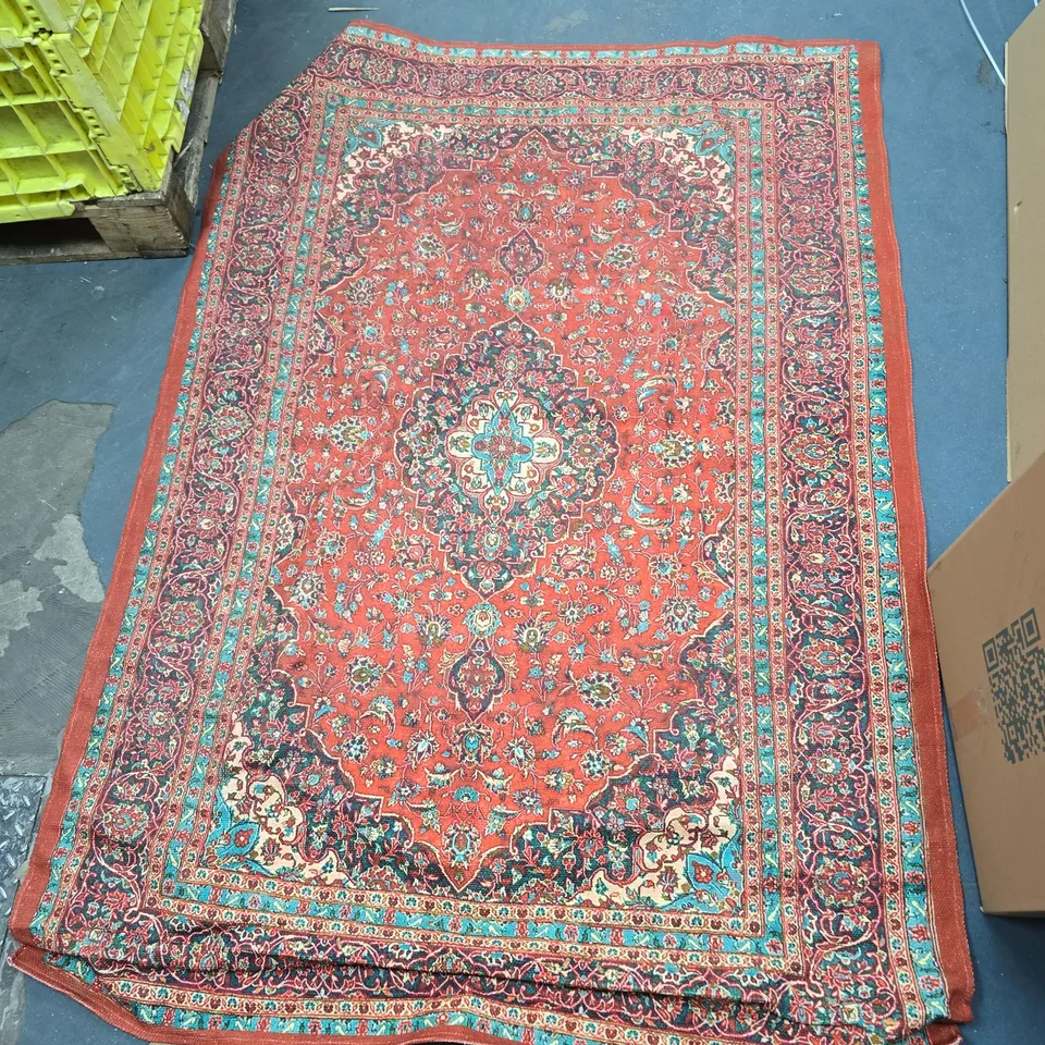 RED ORIENTAL RUG WITH CENTRAL MEDALLION AND INTRICATE BORDER