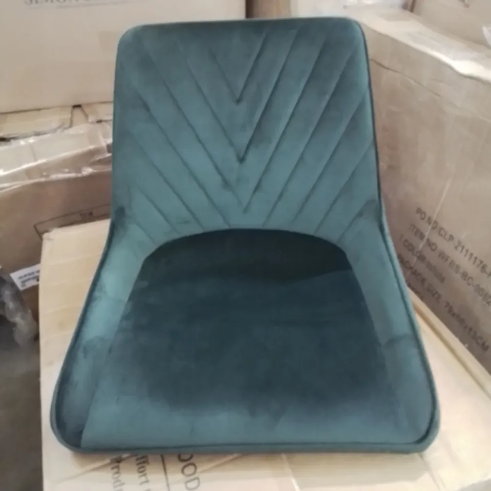 A BOXED PAIR OF GREEN VELVET UPHOLSTERED DINING ROOM CHAIRS