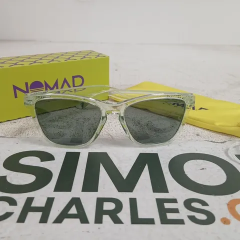 NOMAD SUNGLASSES – CLEAR FRAME WITH GREEN LENSES