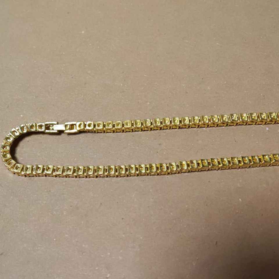 GOLD TONE TENNIS CHAIN WITH STONES
