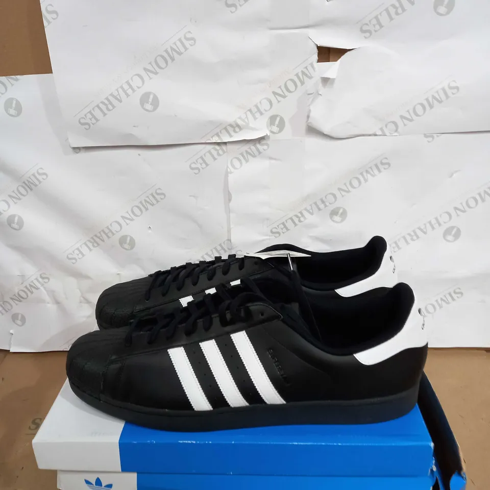 BOXED PAIR OF ADIDAS SUPERSTARS IN BLACK SIZE 19