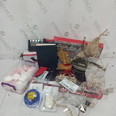 APPROXIMATELY 10 ASSORTED HOUSEHOLD GOODS TO INCLUDE KNIFE SHARPENER, DISHWASHER TABLETS, CHRISTMAS DECORATIONS ETC.