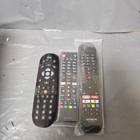 BOX OF ASSORTED REMOTE CONTROLS AND WIRES