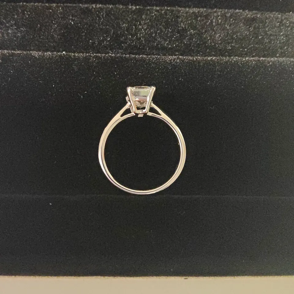9CT WHITE GOLD SOLITAIRE RING SET WITH A LAB GROWN EMERALD CUT DIAMOND WEIGHING +-2.01CT
