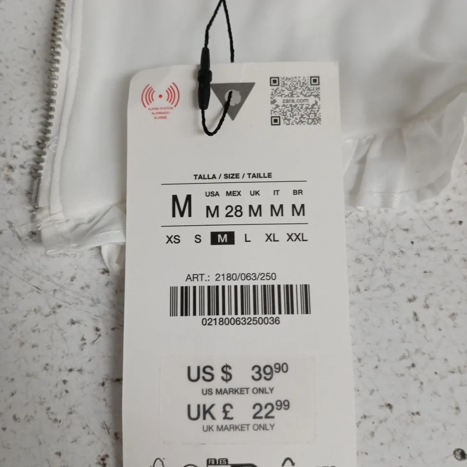 ZARA WOMEN'S WHITE TEXTURED SLEEVELESS TOP WITH RUFFLE HEM – SIZE M