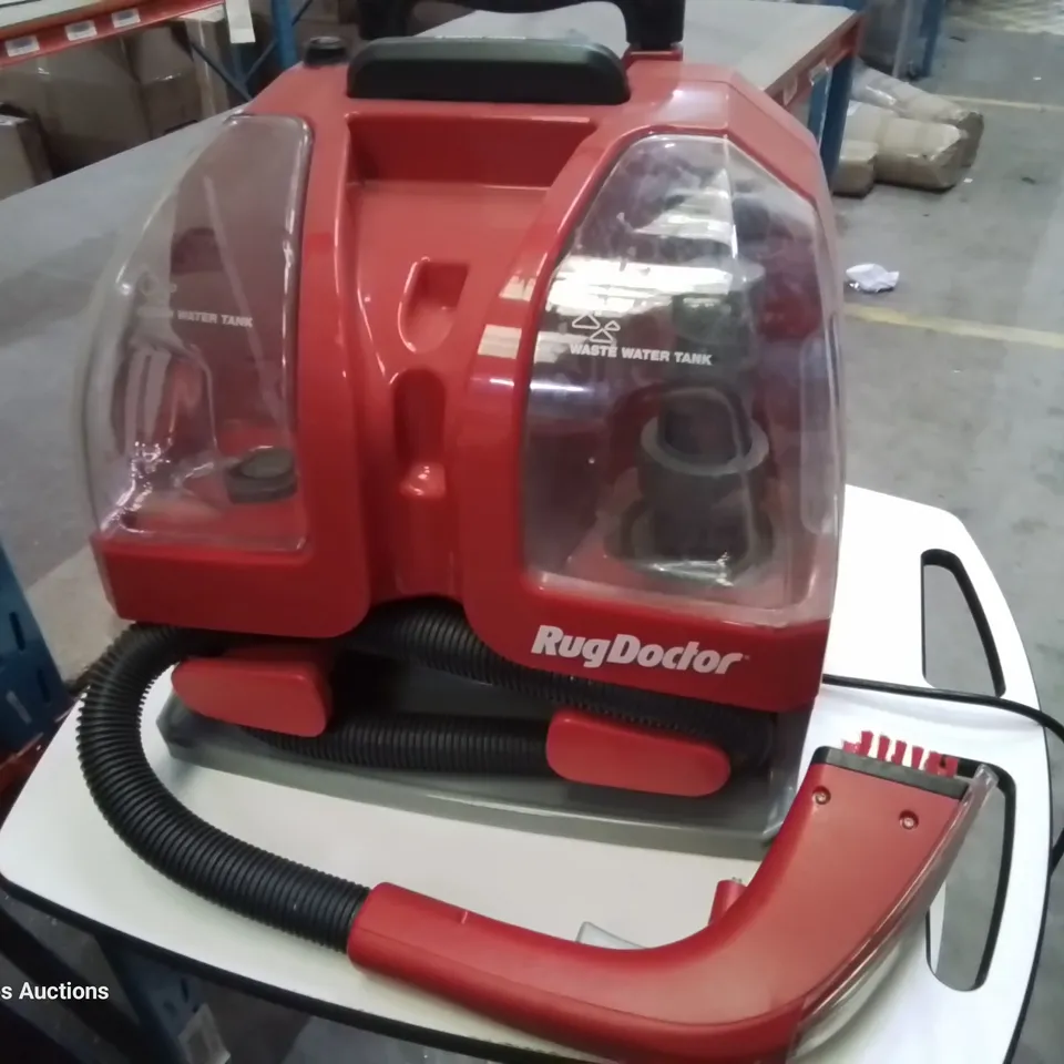 BOXED RUG DOCTOR PORTABLE SPOT CLEANER