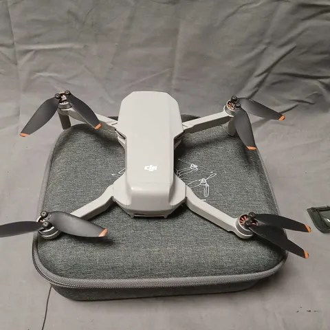 DJI DRONE WITH CONTROLLER – GREY QUADCOPTER WITH CARRY CASE