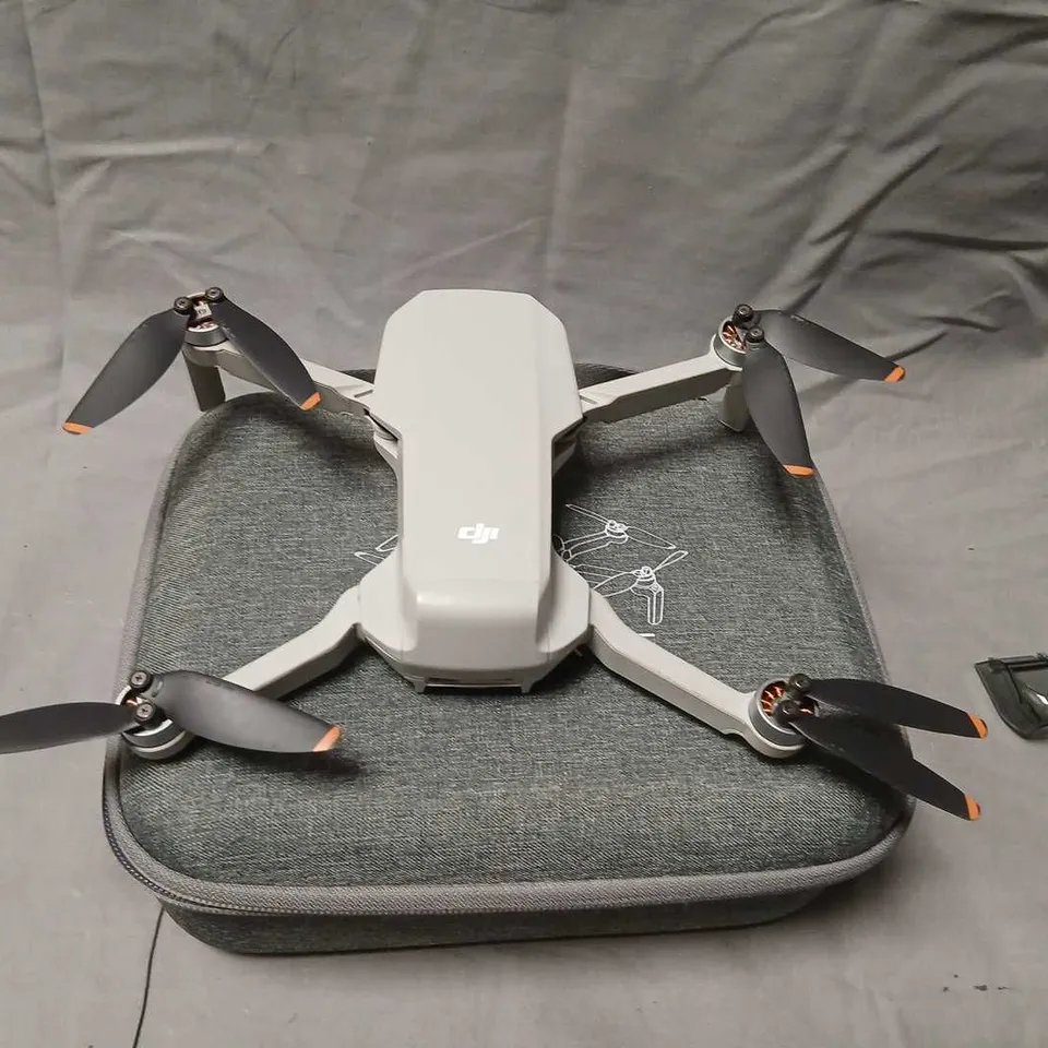 DJI DRONE WITH CONTROLLER – GREY QUADCOPTER WITH CARRY CASE