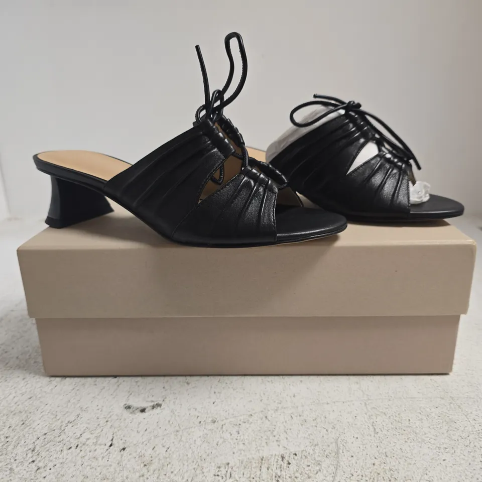 BOXED PAIR OF COLLECTION CHARLES & KEITH OPEN TOE LOW BLOCK HEEL MULES IN BLACK SIZE EU 36