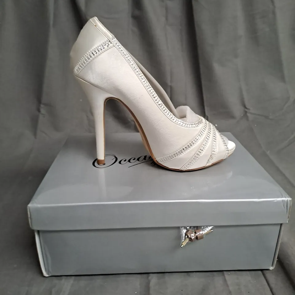 BOXED LOT OF 13 PAIRS OF LADIES OCCASIONS BY CASANDRA HIGH HEELED SHOES. VARIOUS SIZES